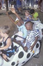 Children enjoying a carnival ride
