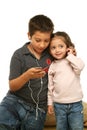 Children enjoying a mp4 player