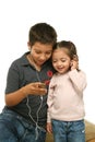 Children enjoying a mp4 player