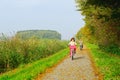 Children enjoying nature on bicycle Royalty Free Stock Photo