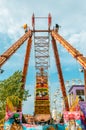 Children enjoying pirate ship ride in amusement park Royalty Free Stock Photo