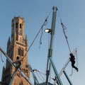 Children enjoying playground on Grote Markt in the city of Bruges