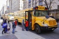 Children entering school bus.