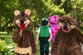 Children entertainers in animal and fairy characters costumes