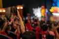 Children excitingly raise hands watching the performance in the theater Royalty Free Stock Photo