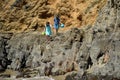 Children exploring rock formations at Crescent Bay in Laguna Beach, California. Royalty Free Stock Photo