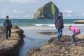 Children explorying tidepools at Pacific City Oregon