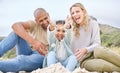 Children, family and beach with girl, mother and father playing in the sand while bonding on holiday or vacation. Travel Royalty Free Stock Photo