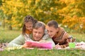 Children and father doing homework