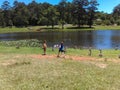 Children feeding ducks