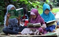 Children fill the school holidays by reading the Qur'an in one of the non-formal education in the city of Solo, Central Java Indon