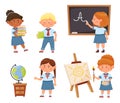 Children on first day of school. Pupils learning, girl writing on blackboard with chalk. Young characters painting on Royalty Free Stock Photo
