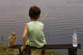 Children fishing in a lake Royalty Free Stock Photo