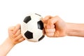 Children fists rested in little soccer ball Royalty Free Stock Photo