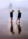 Children on Foggy Beach Vertical