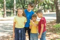 Children in the forest use a compass to study the direction of movement. The concept of children and adolescents outdoor