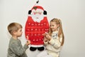 Children found gifts in Felt santa claus advent calendar