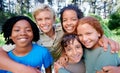Children, friends and hug in portrait on outdoor adventure, support and bonding on camping trip. Diversity, kids and Royalty Free Stock Photo