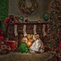 Children in front of fire at Christmas