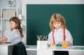 Children girl and boy drawing with coloring pens. Cute school kids painting in class at school. Painting lesson, drawing Royalty Free Stock Photo