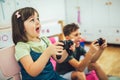 Children - girl and boy playing a video game Royalty Free Stock Photo