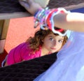 Children girl looking through slide stairway Royalty Free Stock Photo