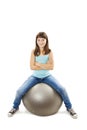 Children girl sitting in pilates ball Royalty Free Stock Photo