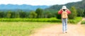 Children girl travel nature summer trips. Asia people kid tourism walking on road nature meadow, Royalty Free Stock Photo