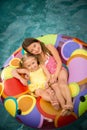 Children girls swim inner tube Royalty Free Stock Photo