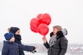 Children give mom balloons