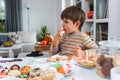 Kids decorating cookies for Halloween