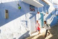 Children going to school in a hurry in the early morning