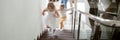 Children going upstairs to second floor their new modern house Royalty Free Stock Photo