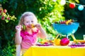 Children grilling meat. Family camping and enjoying BBQ. Royalty Free Stock Photo