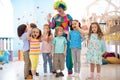 Children group with clown celebrating birthday party Royalty Free Stock Photo