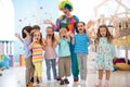 Children group with clown celebrating birthday party Royalty Free Stock Photo