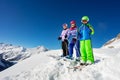 Children group in snow on top of the mountain Royalty Free Stock Photo