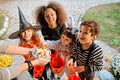 Children in Halloween costumes, trick or treating Royalty Free Stock Photo