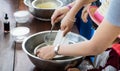 Children hand making home made ice cream cooking class