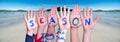 Children Hands Building Word Season, Ocean Background Royalty Free Stock Photo