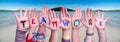 Children Hands Building Word Teamwork, Ocean Background Royalty Free Stock Photo