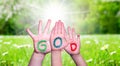 Children Hands Building Word God, Grass Meadow Royalty Free Stock Photo