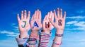 Children Hands Building Word Jahr Means Year, Blue Sky