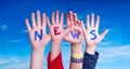 Children Hands Building Word News, Blue Sky