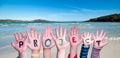 Children Hands Building Word Project, Sea And Ocean Background Royalty Free Stock Photo
