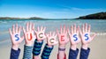 Children Hands Building Word Success, Sea And Ocean Background Royalty Free Stock Photo