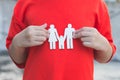 Children hands holding small model family , concept family Royalty Free Stock Photo