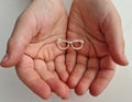 Children hands small glasses optics vision problems in children