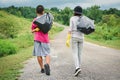 Children hands in yellow gloves picking up empty of bottle plastic Royalty Free Stock Photo