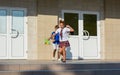 Children happily run from school after the end of lessons